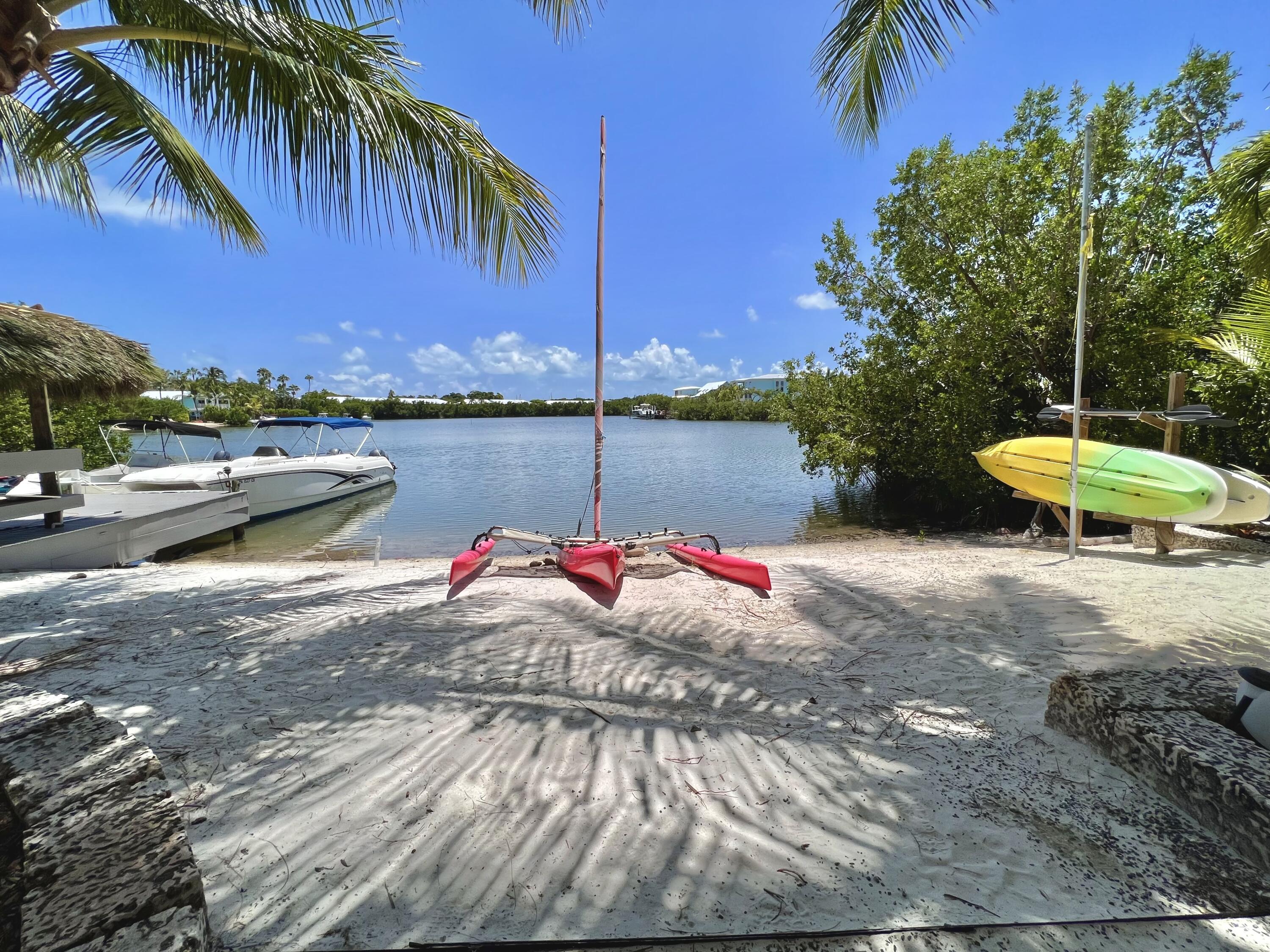 24 Bounty Lane Key Largo, FL 33037 - Photo 29 of 36 a view of a lake with a yard