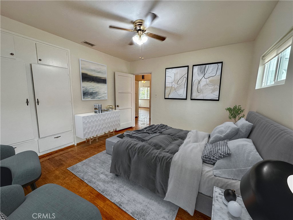 823 Edith Avenue Alhambra, CA 91803 - Photo 22 of 46 a bedroom with a bed couch and window