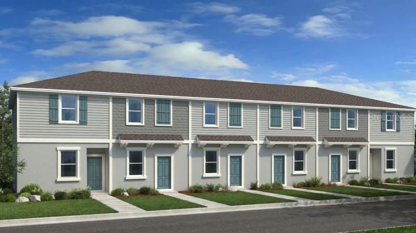 2927 Skyline Loop Kissimmee, FL 34758 - Photo 1 of 1 a front view of a house with a yard