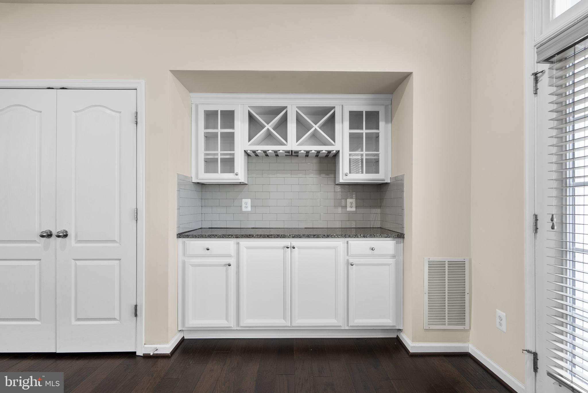 7103 Beaumont Place, Unit A Hanover, MD 21076 - Photo 11 of 53 Butler's pantry w/glass display cabinets
