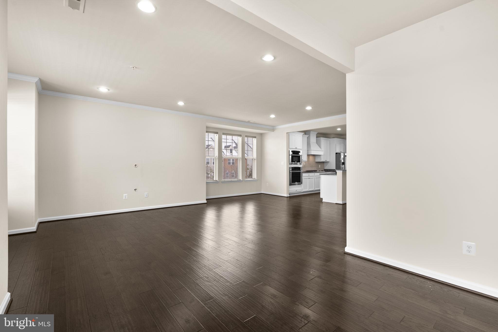 7103 Beaumont Place, Unit A Hanover, MD 21076 - Photo 17 of 53 Neutral paint and custom wood blinds