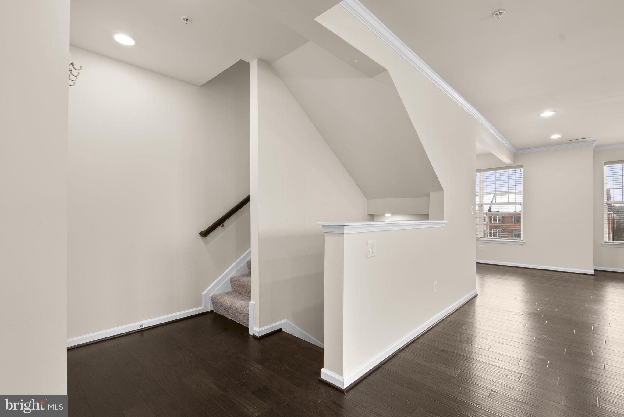7103 Beaumont Place, Unit A Hanover, MD 21076 - Photo 20 of 53 Staircase access to upper level