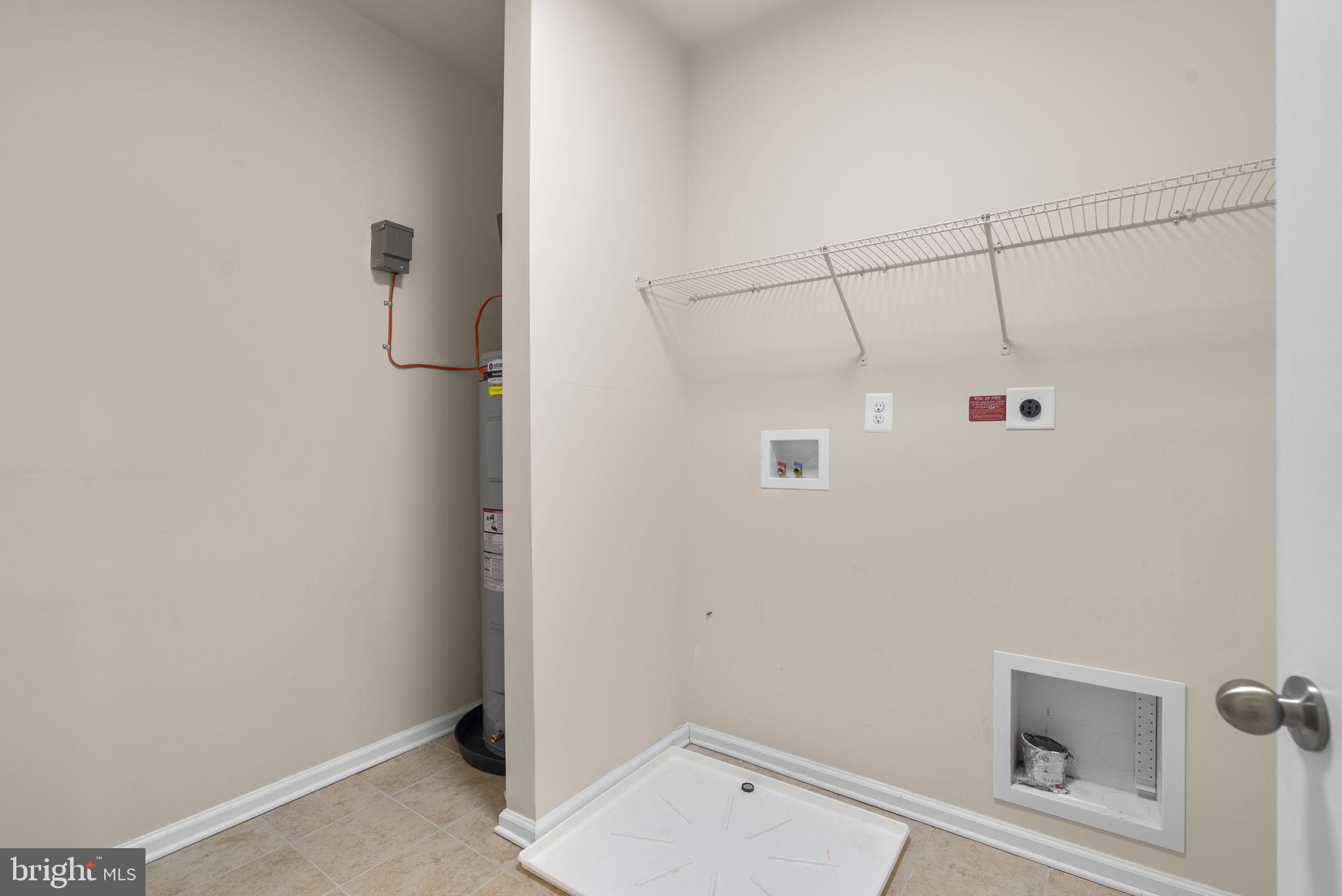 7103 Beaumont Place, Unit A Hanover, MD 21076 - Photo 32 of 53 Walk-in laundry room