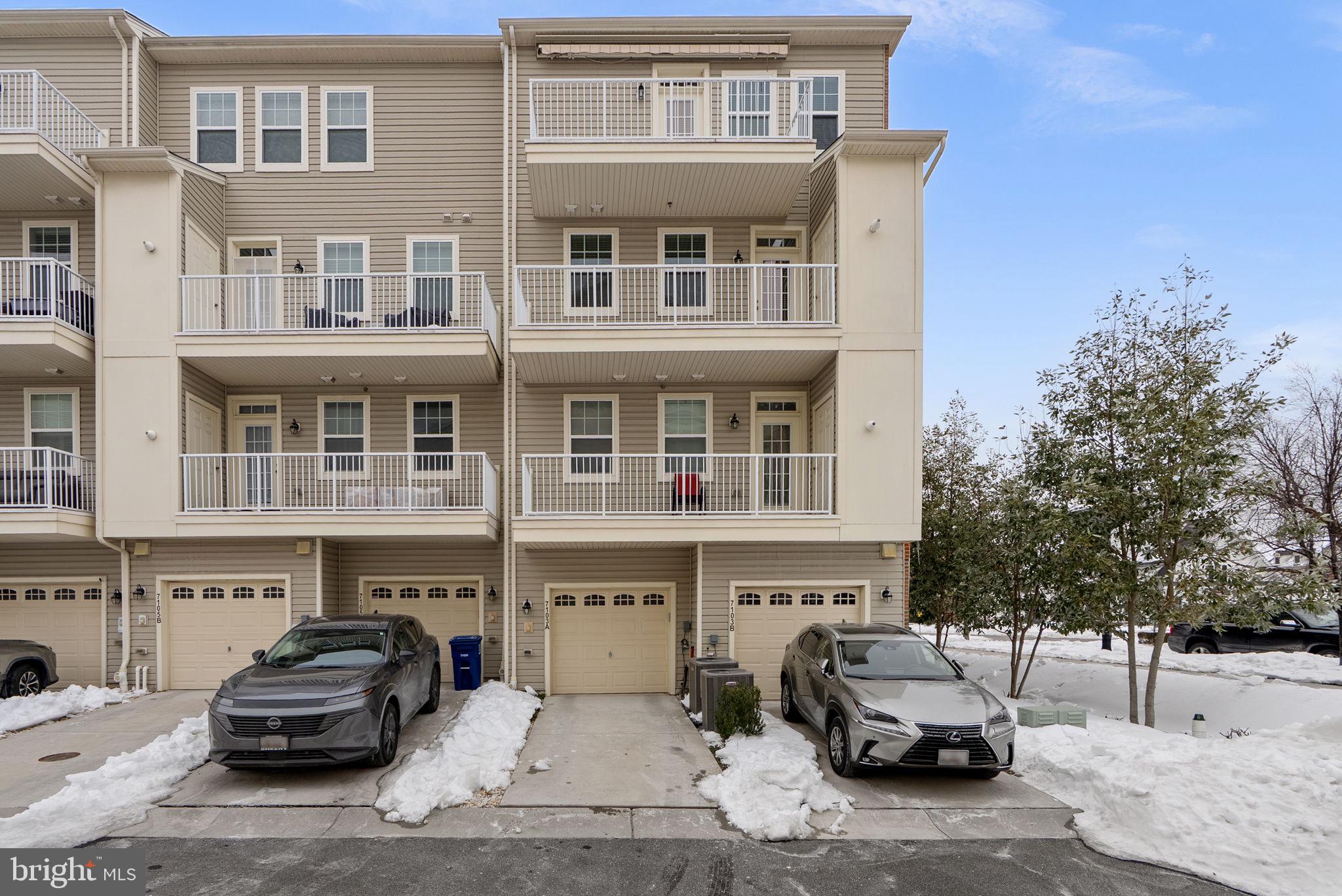 7103 Beaumont Place, Unit A Hanover, MD 21076 - Photo 37 of 53 Rear 1-car garage and 2 level decks