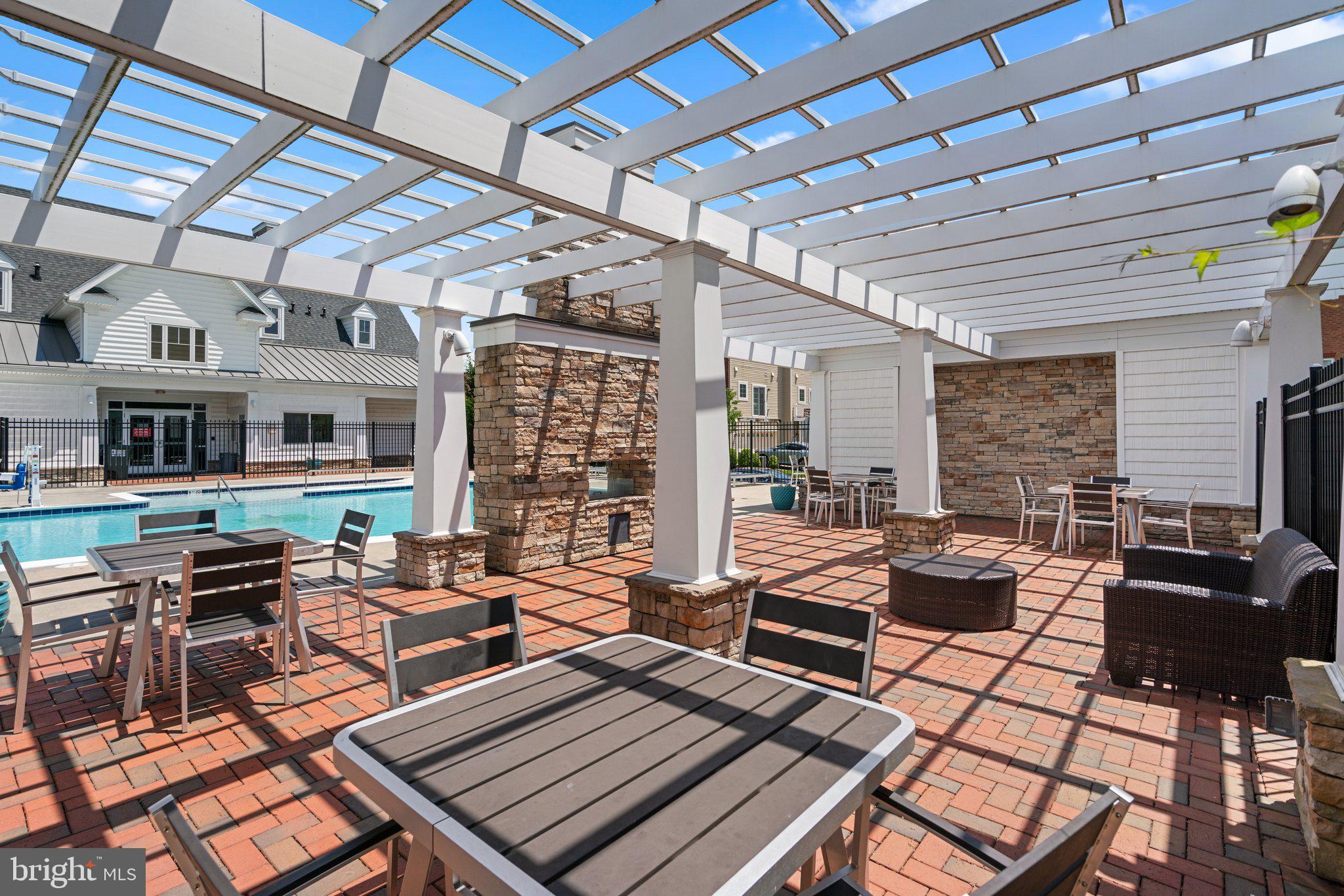 7103 Beaumont Place, Unit A Hanover, MD 21076 - Photo 43 of 53 Community patio and outdoor fireplace