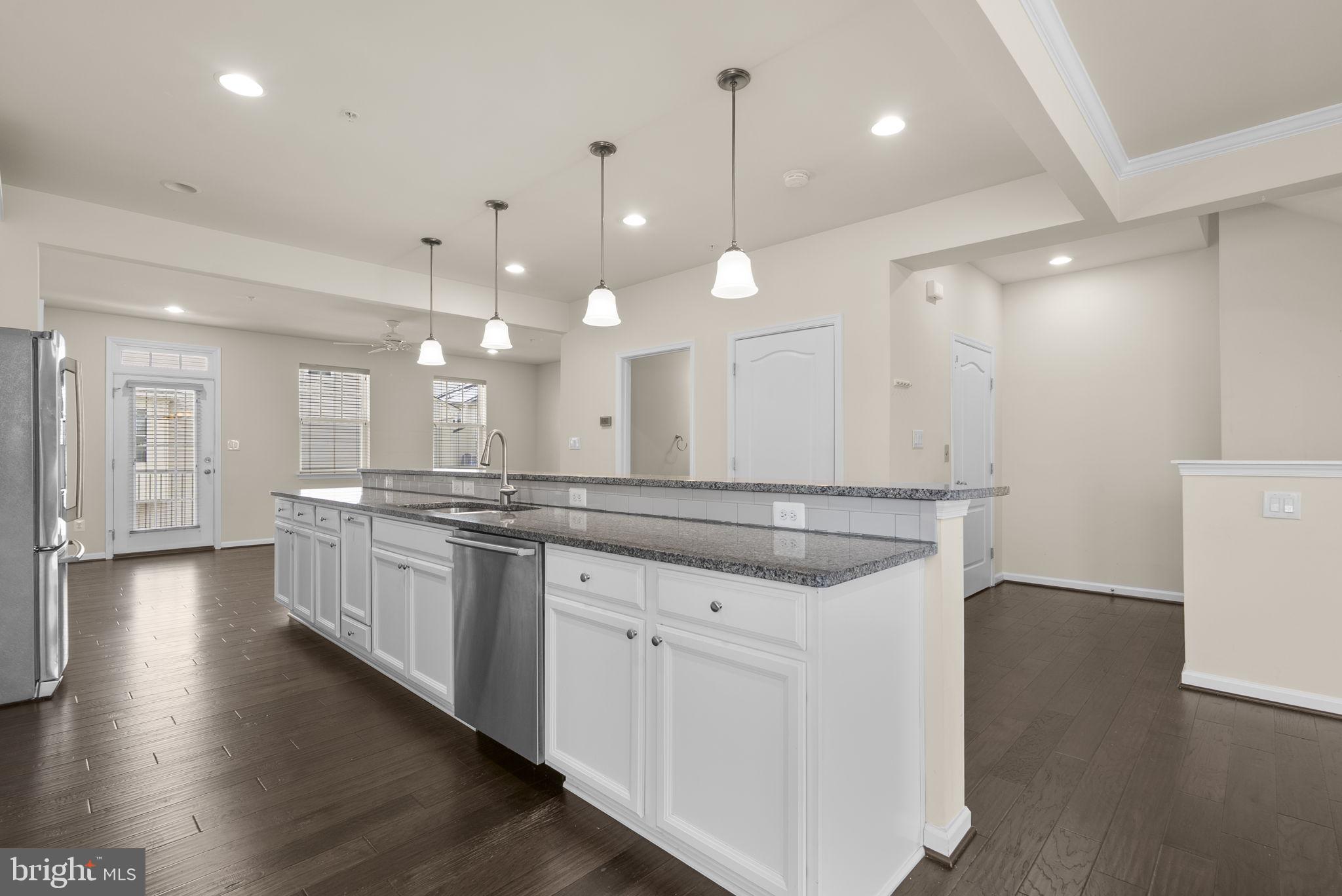 7103 Beaumont Place, Unit A Hanover, MD 21076 - Photo 8 of 53 Expansive center island w/raised breakfast bar