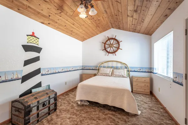 a view of a backyard with a small pool