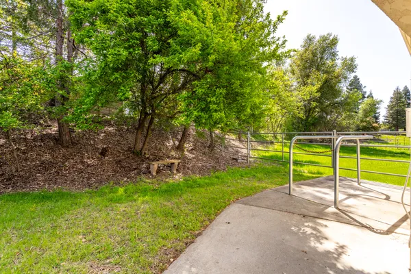 a view of porch with wooden floor