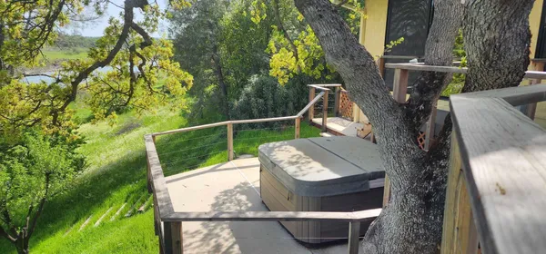 a view of a livingroom with furniture and windows