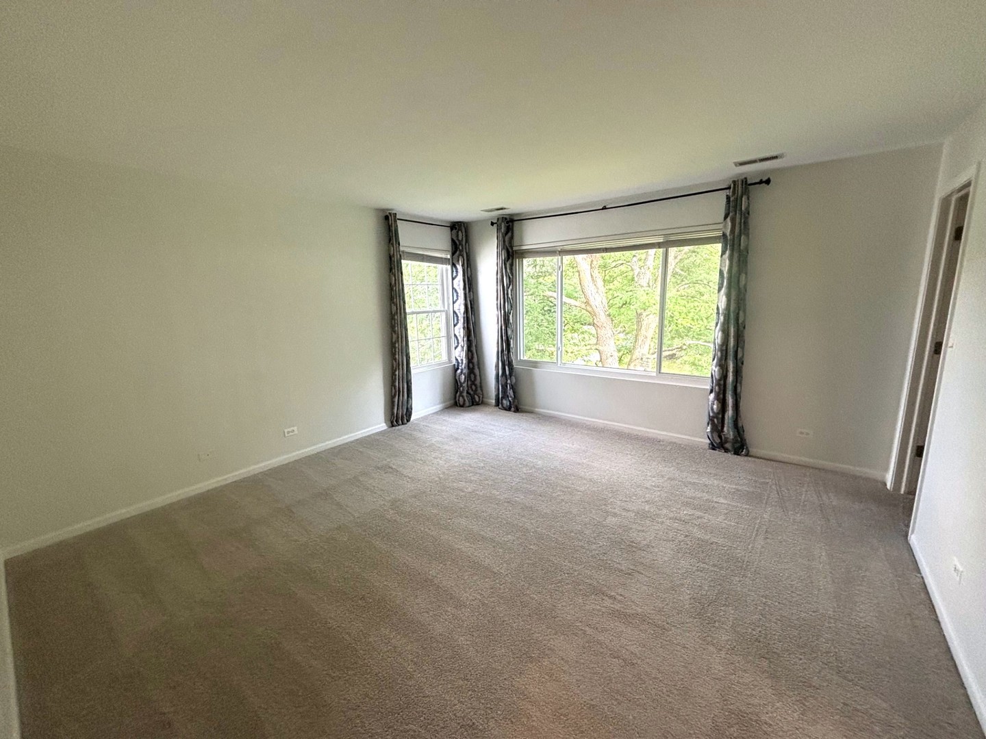 2468 Reflections Drive Aurora, IL 60502 - Photo 23 of 44 a view of an empty room with a window