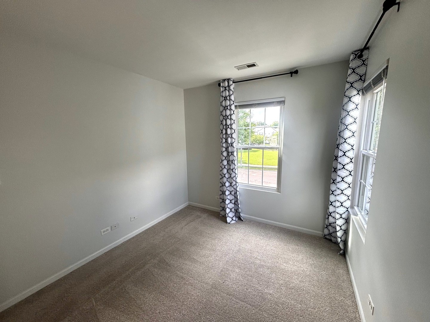 2468 Reflections Drive Aurora, IL 60502 - Photo 29 of 44 a view of an empty room with a window