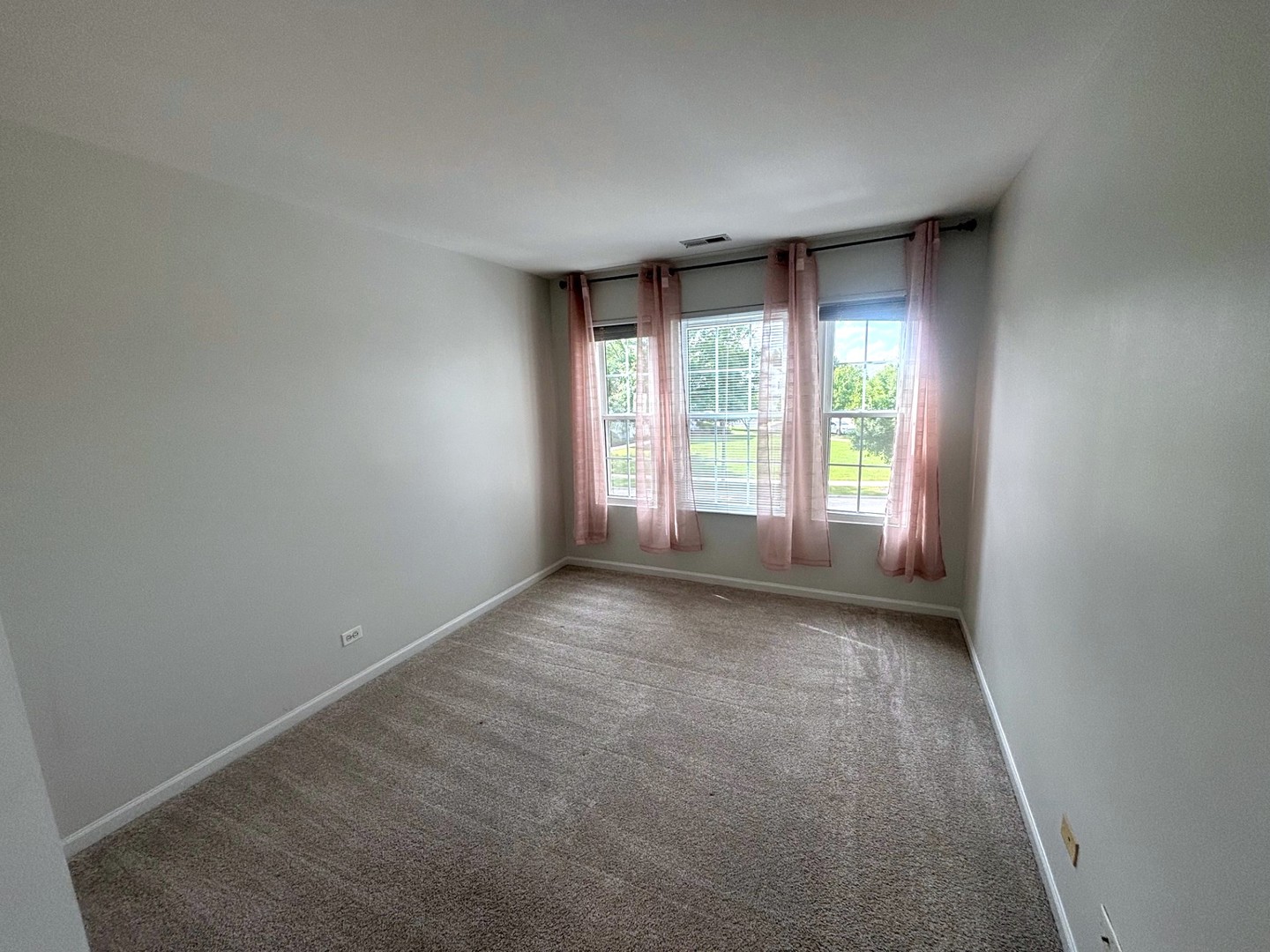 2468 Reflections Drive Aurora, IL 60502 - Photo 32 of 44 an empty room with windows