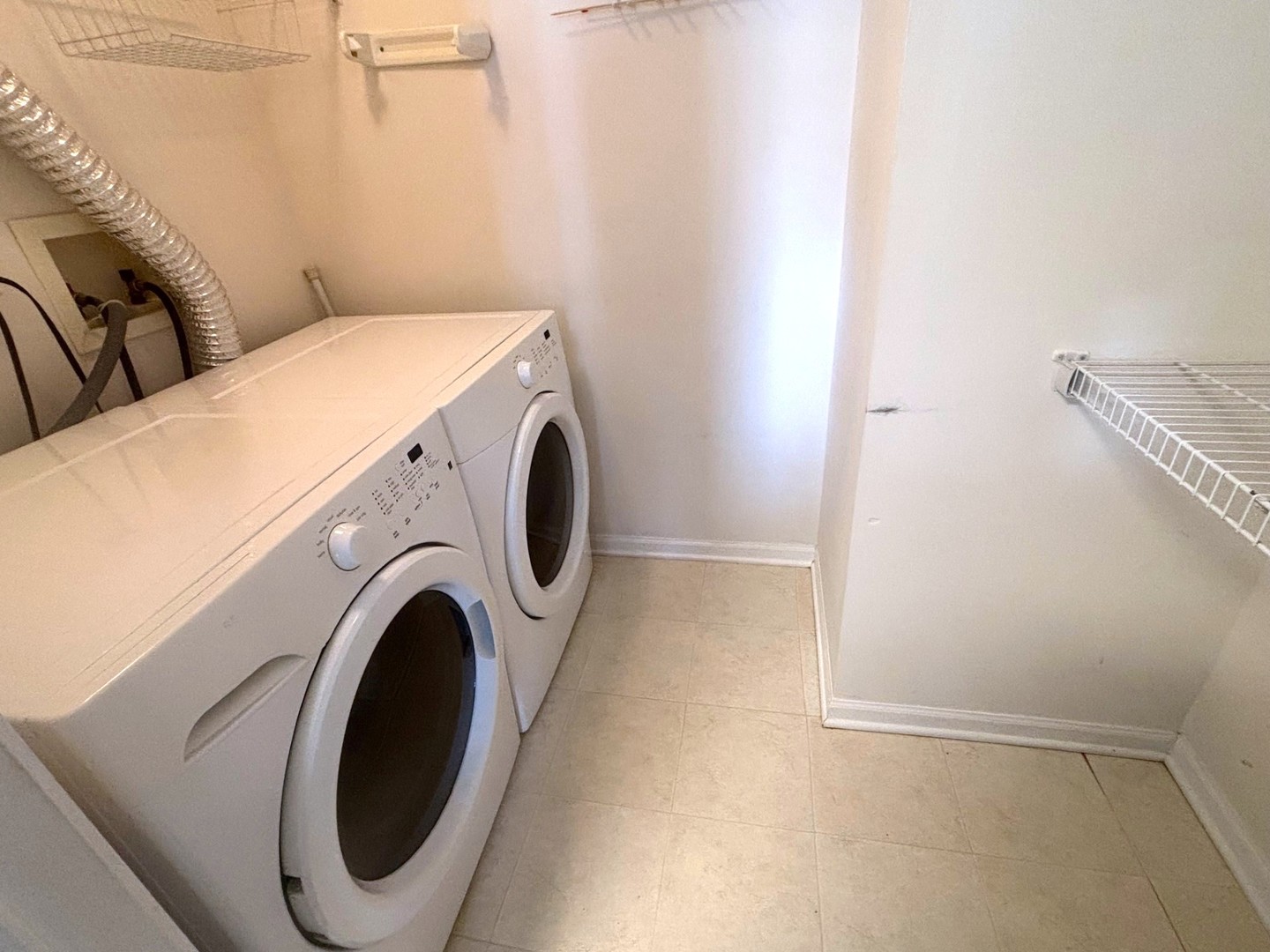 2468 Reflections Drive Aurora, IL 60502 - Photo 35 of 44 a utility room with dryer and washer