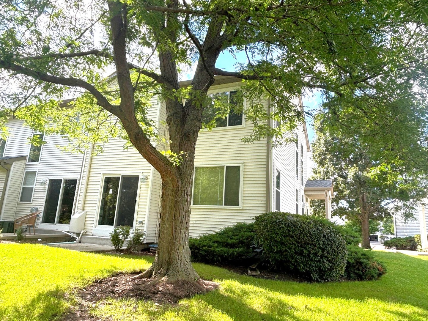 2468 Reflections Drive Aurora, IL 60502 - Photo 41 of 44 a view of a house with swimming pool next to a yard