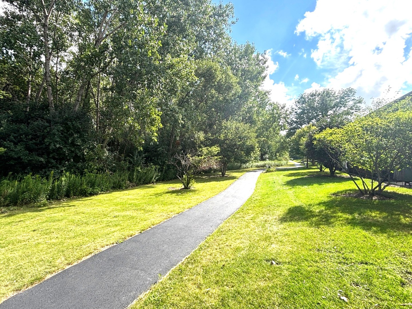 2468 Reflections Drive Aurora, IL 60502 - Photo 43 of 44 a view of a swimming pool with an outdoor space and seating area