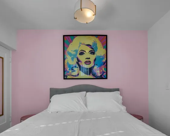 a picture of a wall with a painting on the wall