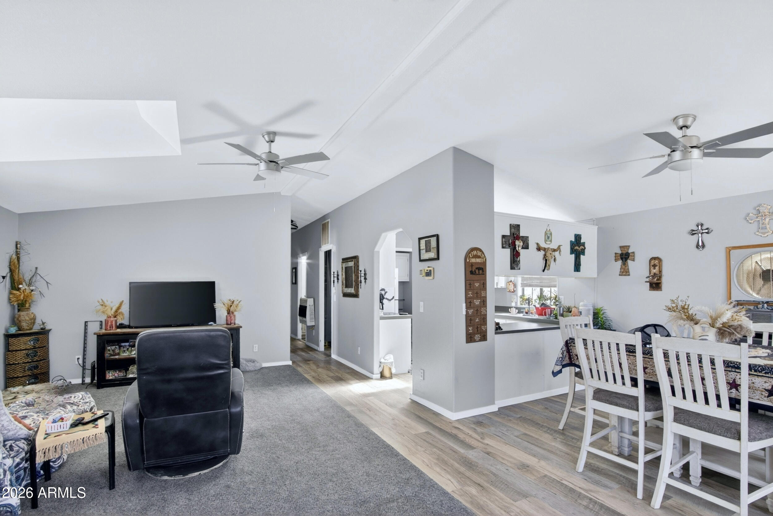 38809 East Spotted Horse Road Florence, AZ 85132 - Photo 11 of 40 a living room with furniture and a flat screen tv