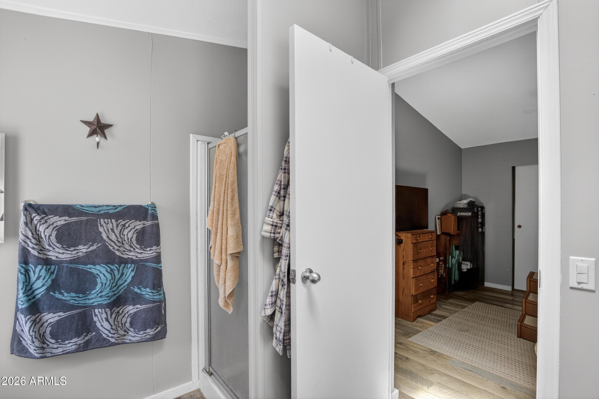 38809 East Spotted Horse Road Florence, AZ 85132 - Photo 16 of 40 a view of a livingroom with furniture and a hallway