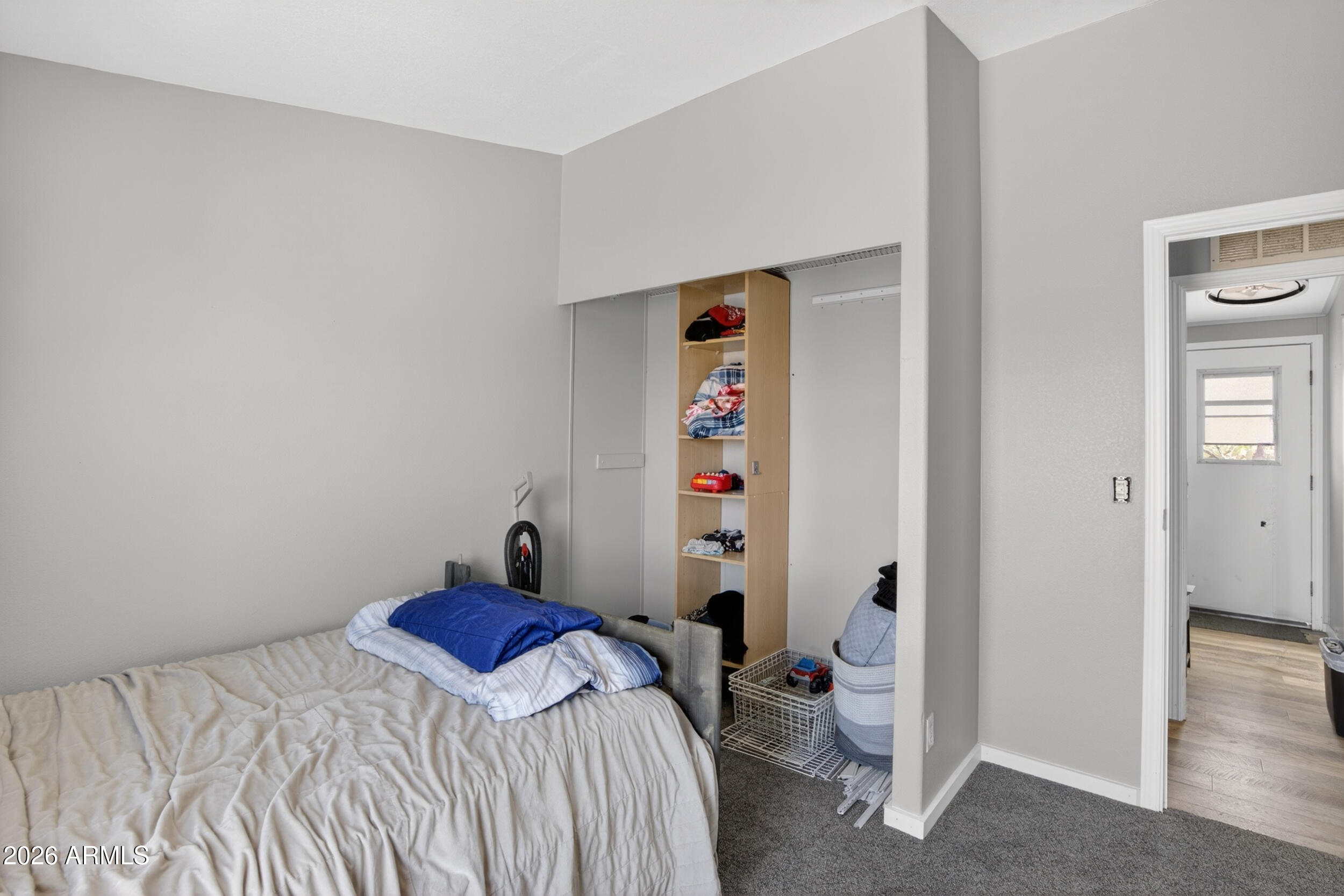 38809 East Spotted Horse Road Florence, AZ 85132 - Photo 20 of 40 a bedroom with a bed and a window