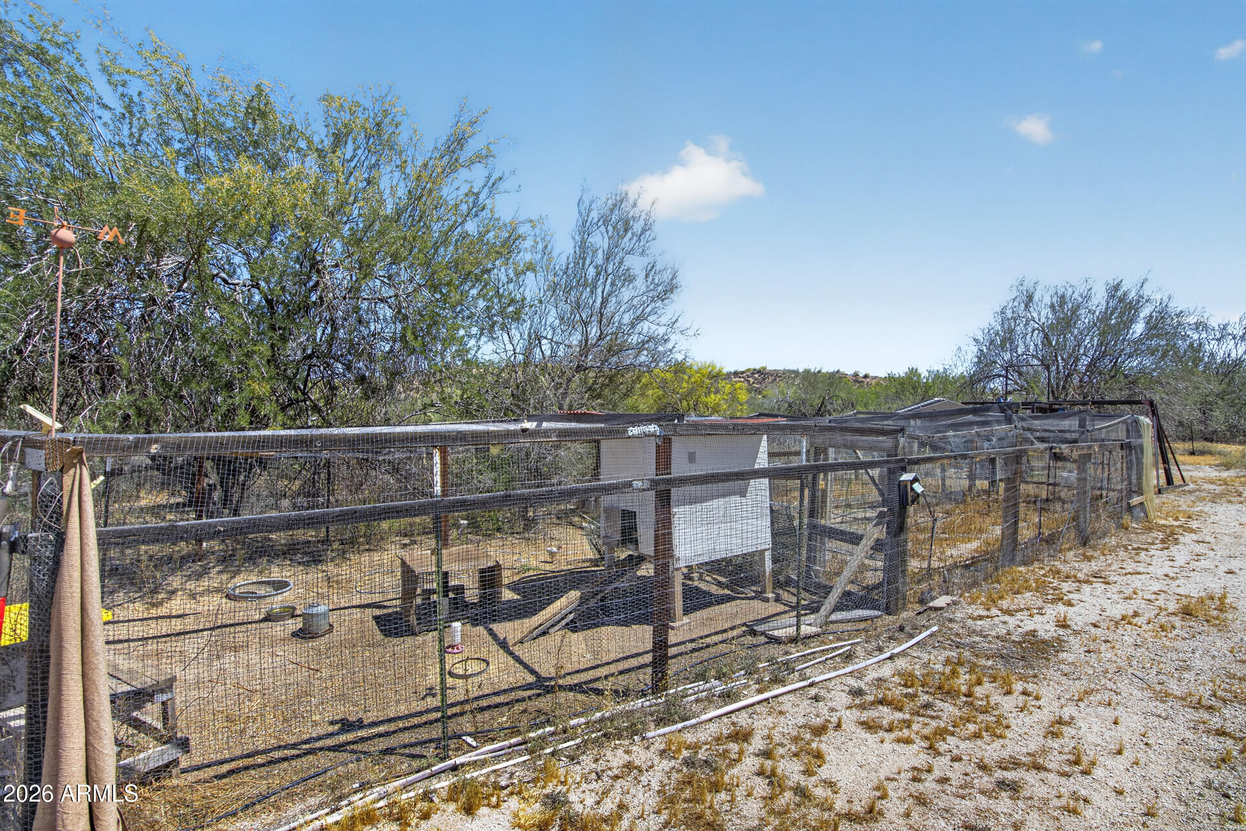 38809 East Spotted Horse Road Florence, AZ 85132 - Photo 25 of 40 a view of a chairs and table on the terrace