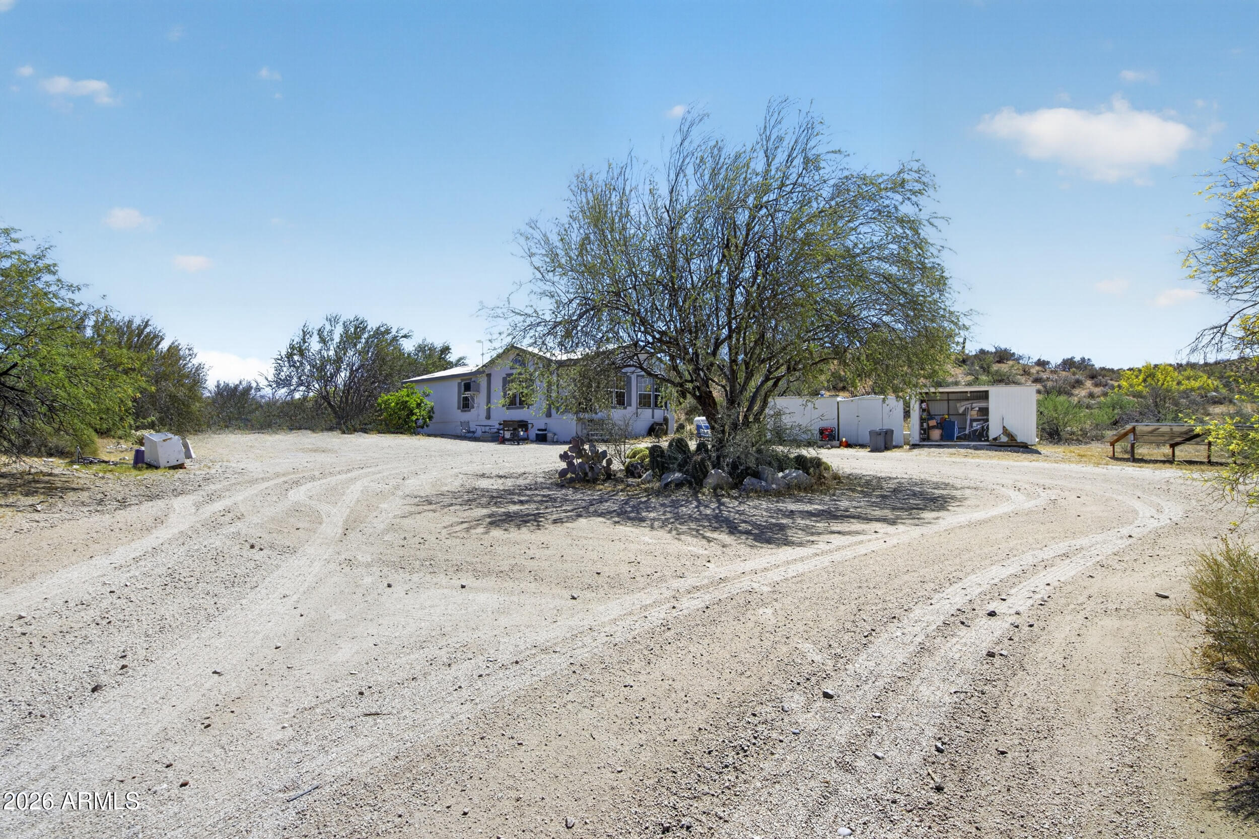 38809 East Spotted Horse Road Florence, AZ 85132 - Photo 28 of 40 a view of a backyard of the house