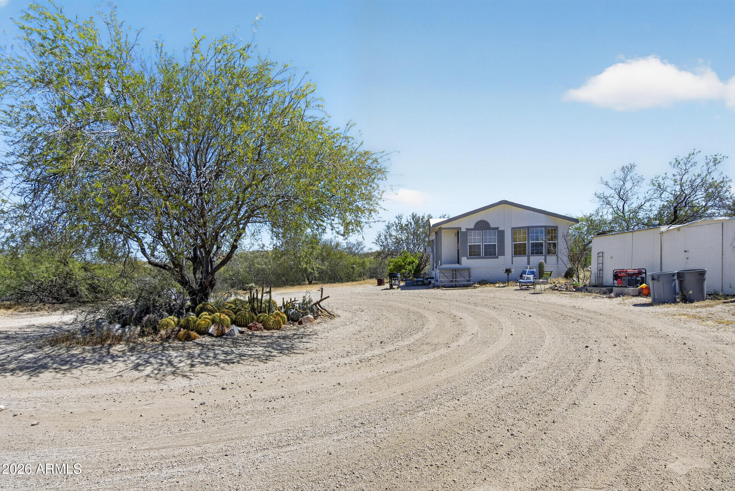 38809 East Spotted Horse Road Florence, AZ 85132 - Photo 31 of 40 a front view of a house with a yard