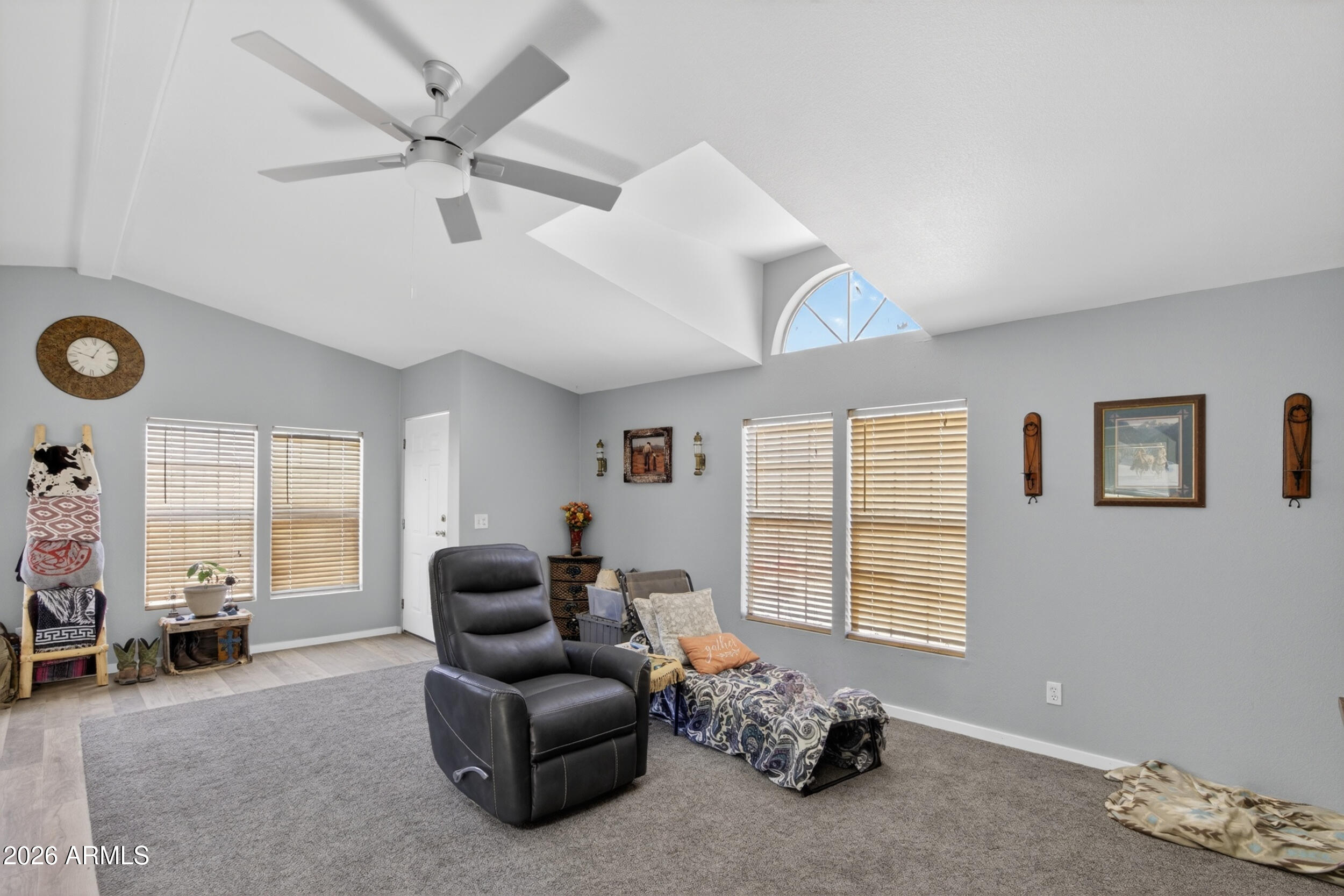 38809 East Spotted Horse Road Florence, AZ 85132 - Photo 7 of 40 a living room with furniture and a window