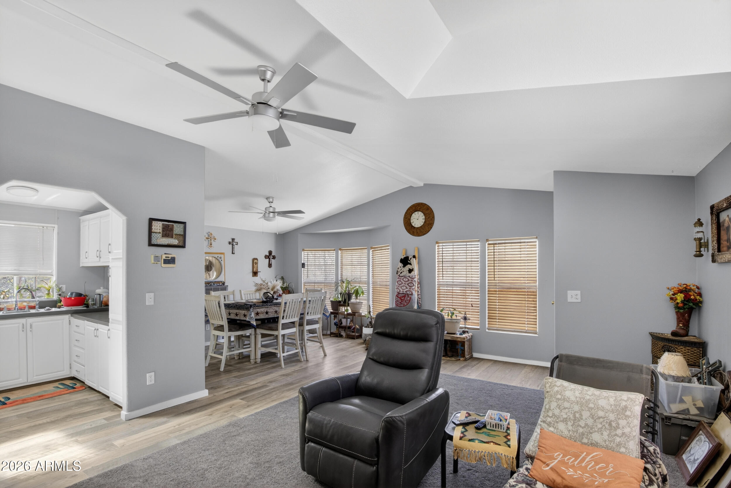 38809 East Spotted Horse Road Florence, AZ 85132 - Photo 8 of 40 a living room with furniture and a window