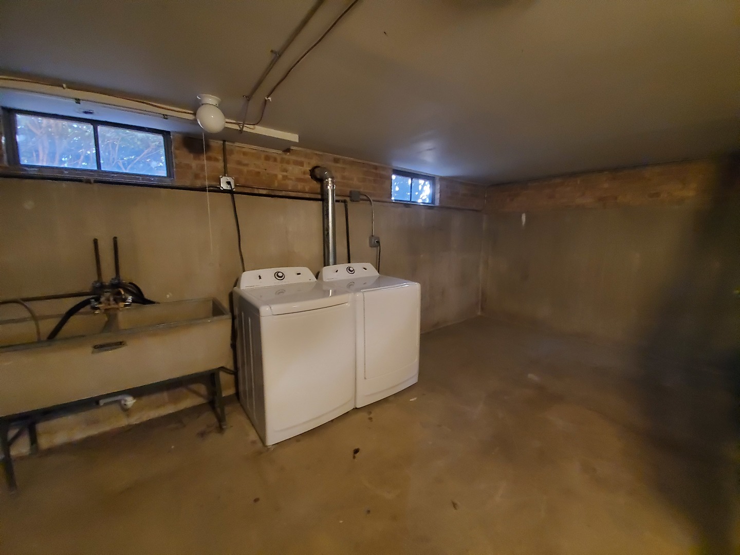 8307 Ballard Road Niles, IL 60714 - Photo 17 of 22 a utility room with dryer and washer