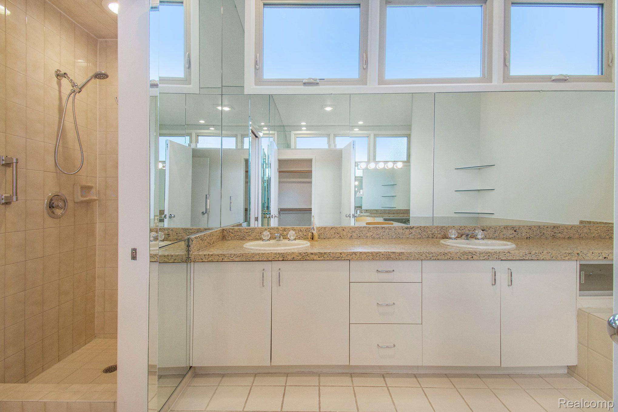 5262 Simpson Lake Road West Bloomfield, MI 48323 - Photo 28 of 39 Large and bright primary bathroom