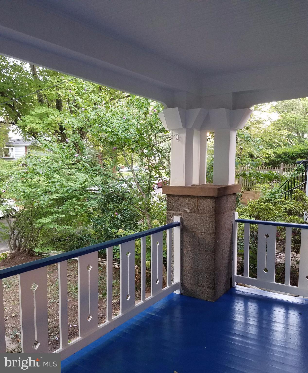4429 P Street Northwest Washington, DC 20007 - Photo 2 of 11 a balcony with wooden floor and outdoor space