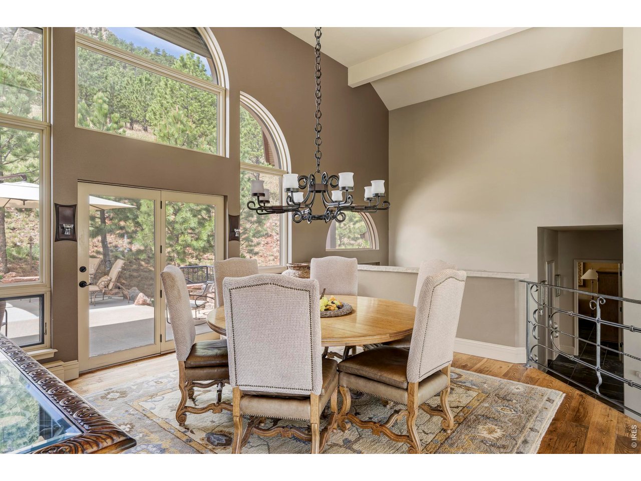 86 South Cedar Brook Road Boulder, CO 80304 - Photo 12 of 40 a dining room with furniture and wooden floor
