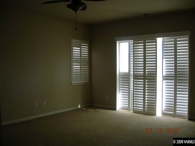 1810 Granite Chief Drive Reno, NV 89521 - Photo 4 of 9 a view of an empty room with a window