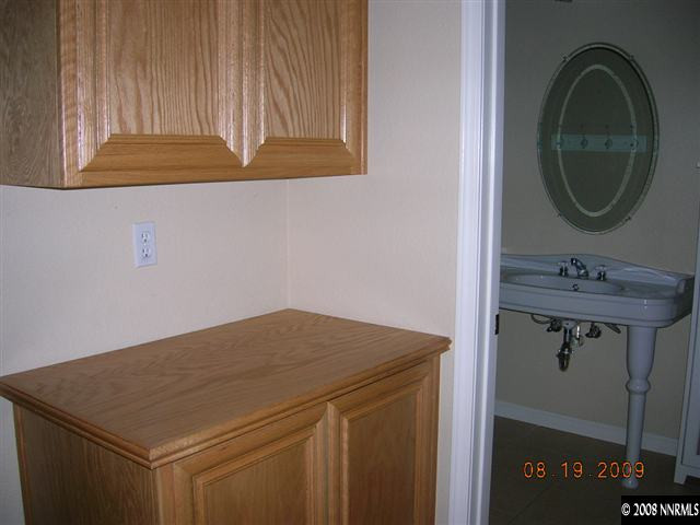 1810 Granite Chief Drive Reno, NV 89521 - Photo 7 of 9 a bathroom with a sink and a mirror