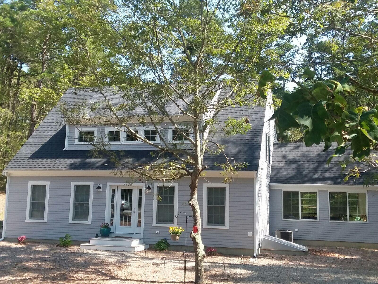 45 Perch Pond Way Wellfleet, MA 02667 - Photo 1 of 82 front view of a house with a tree