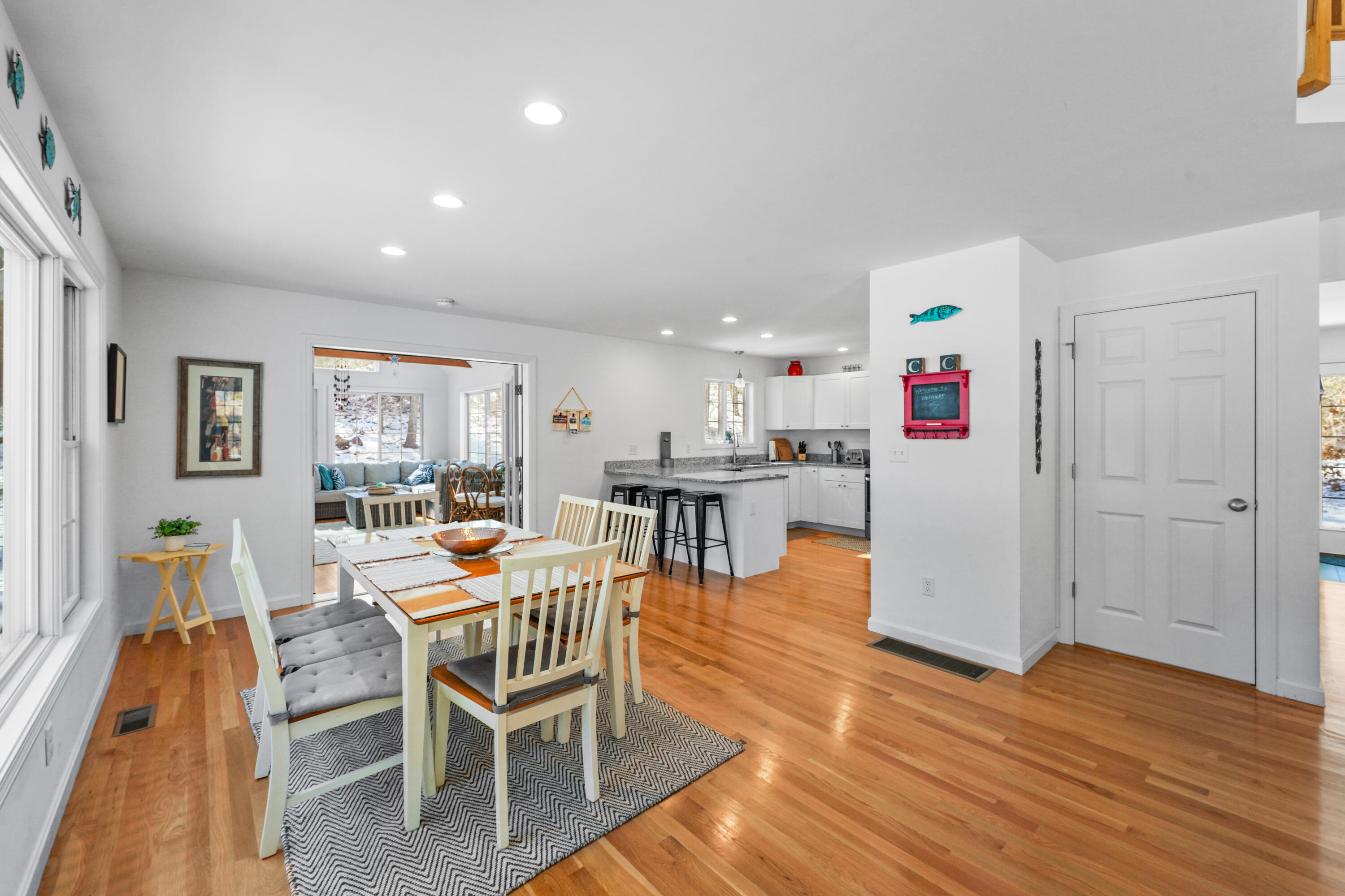45 Perch Pond Way Wellfleet, MA 02667 - Photo 12 of 82 a dining room with furniture and wooden floor
