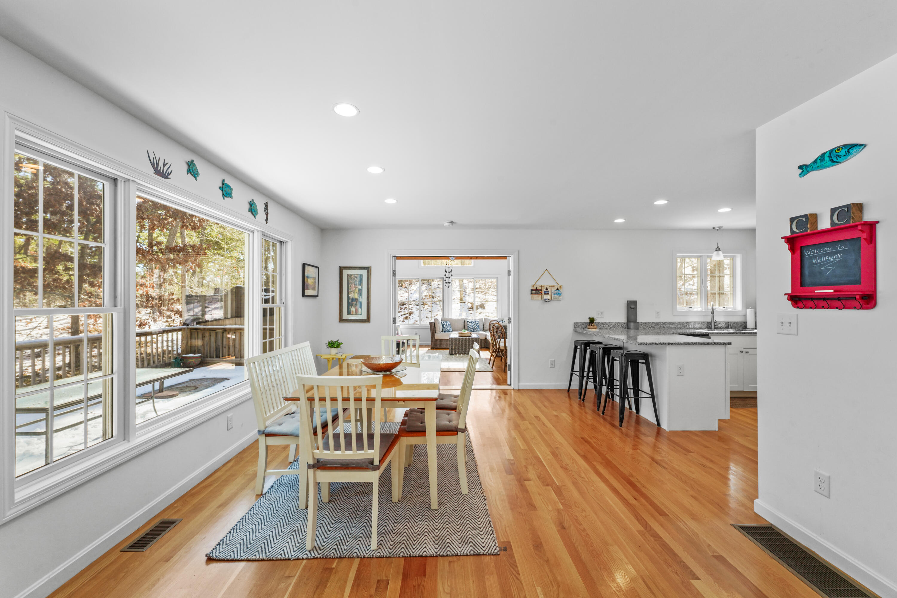 45 Perch Pond Way Wellfleet, MA 02667 - Photo 13 of 82 a dining room with furniture and wooden floor