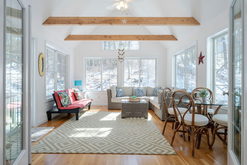 45 Perch Pond Way Wellfleet, MA 02667 - Photo 15 of 82 a living room with furniture and a large window