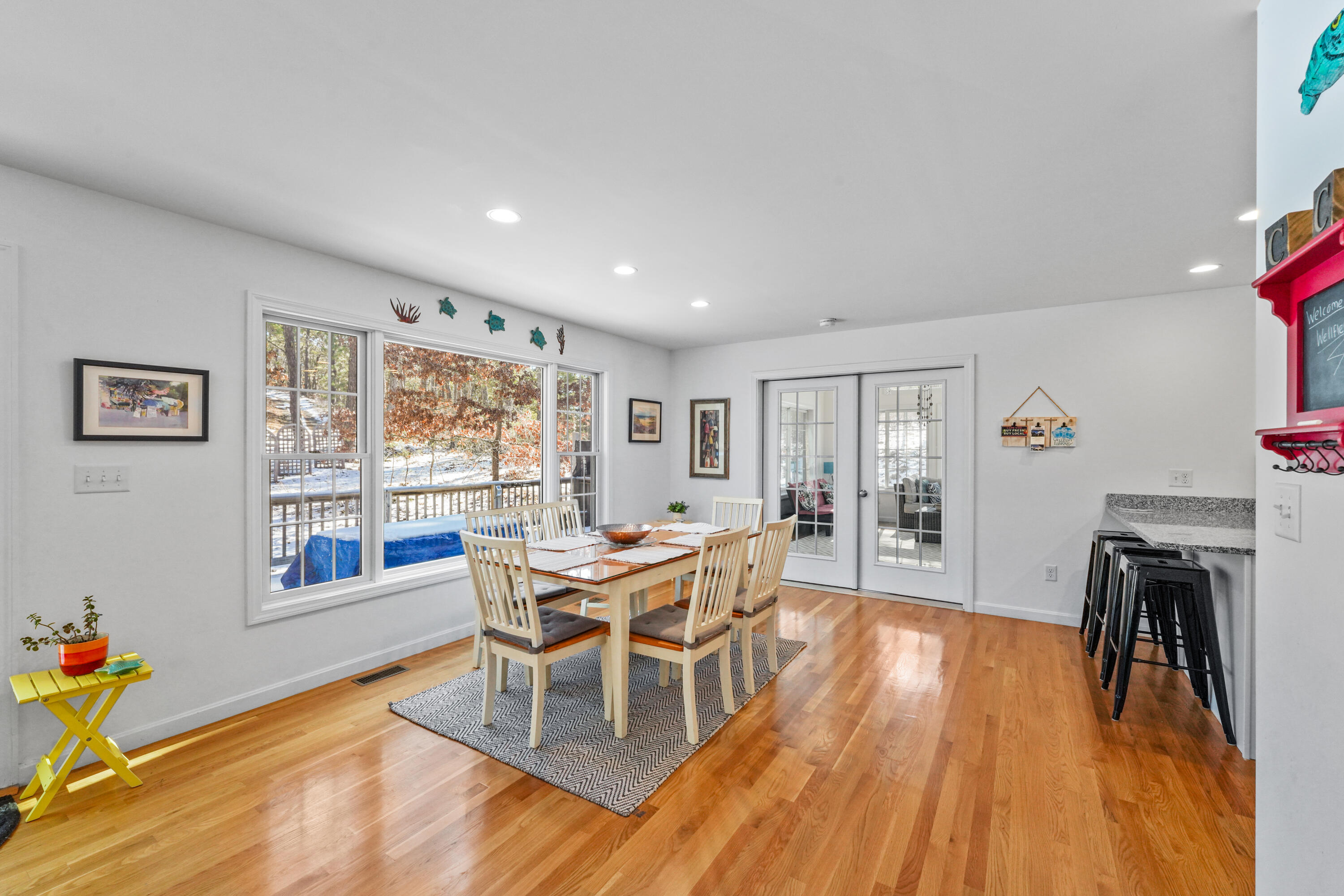 45 Perch Pond Way Wellfleet, MA 02667 - Photo 21 of 82 a living room with furniture a fireplace and wooden floor