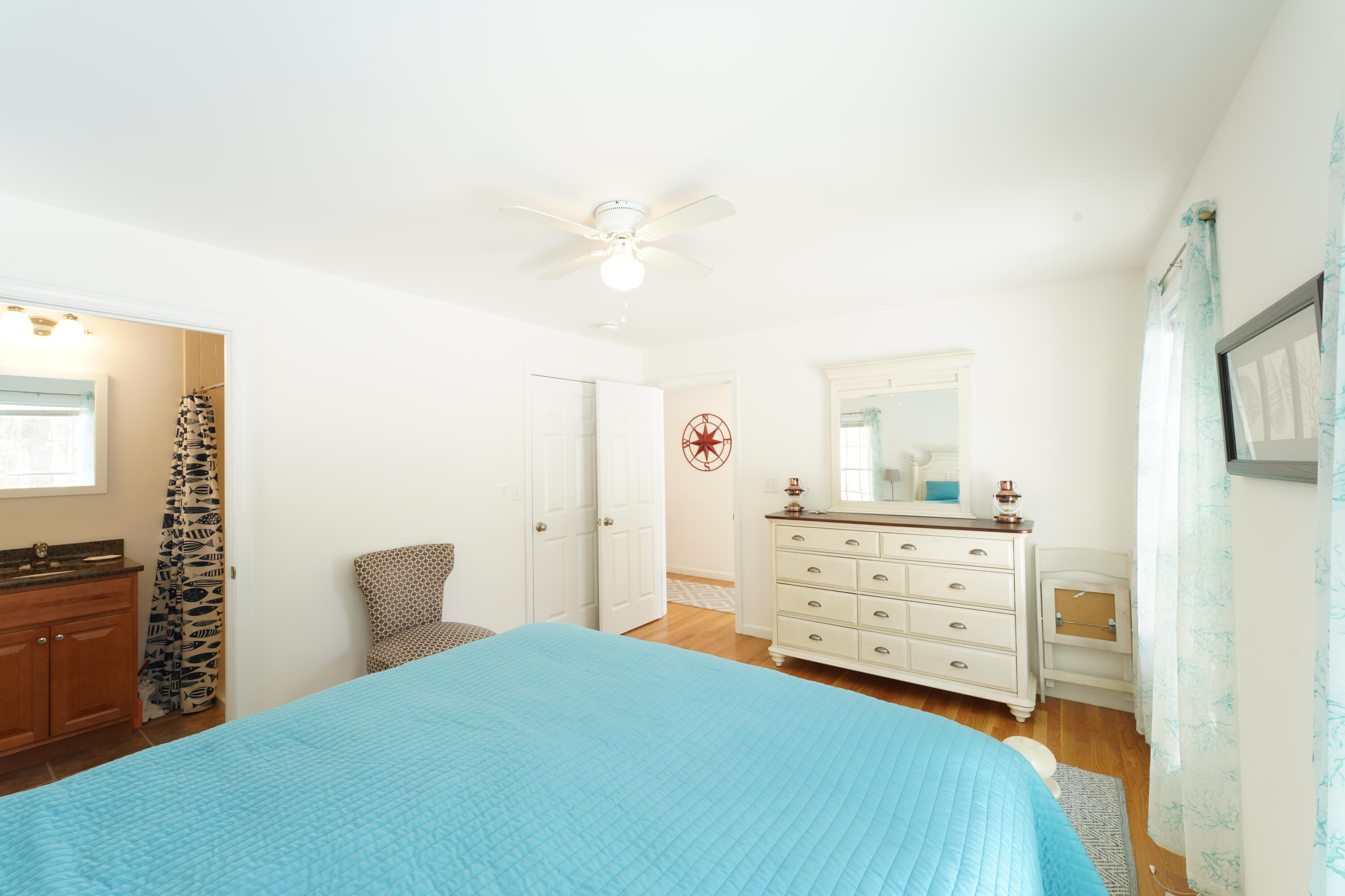 45 Perch Pond Way Wellfleet, MA 02667 - Photo 33 of 82 a bedroom with a bed and dresser