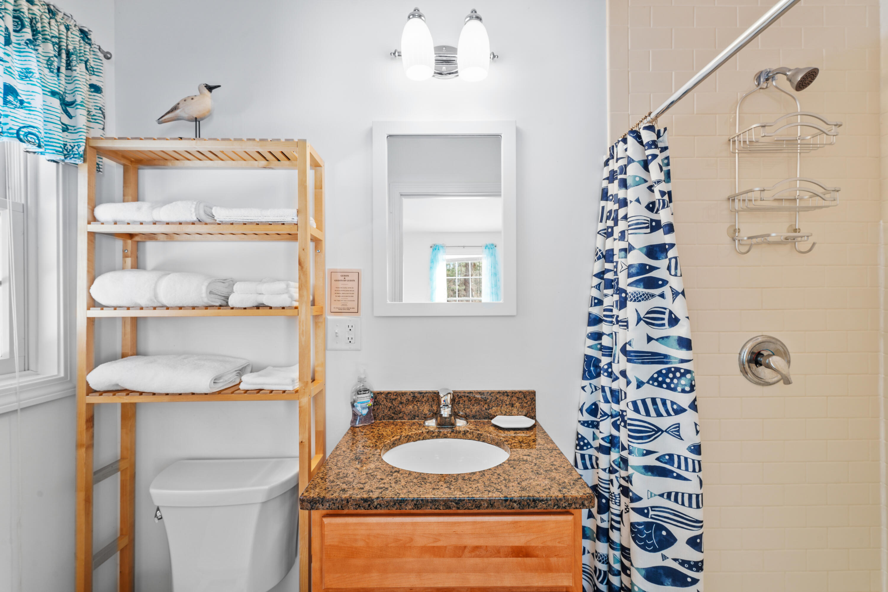 45 Perch Pond Way Wellfleet, MA 02667 - Photo 41 of 82 a bathroom with a granite countertop sink and a mirror