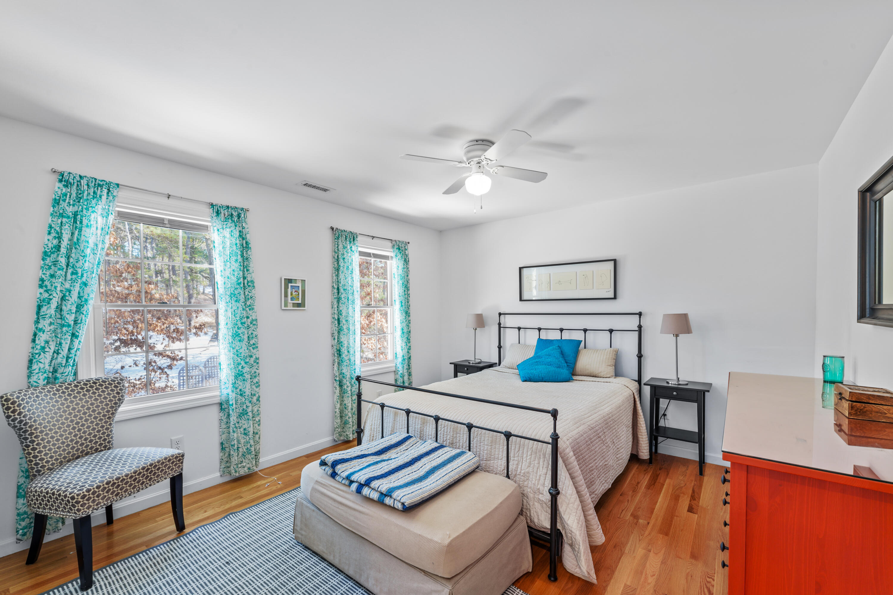 45 Perch Pond Way Wellfleet, MA 02667 - Photo 56 of 82 a bedroom with furniture and a wooden floor