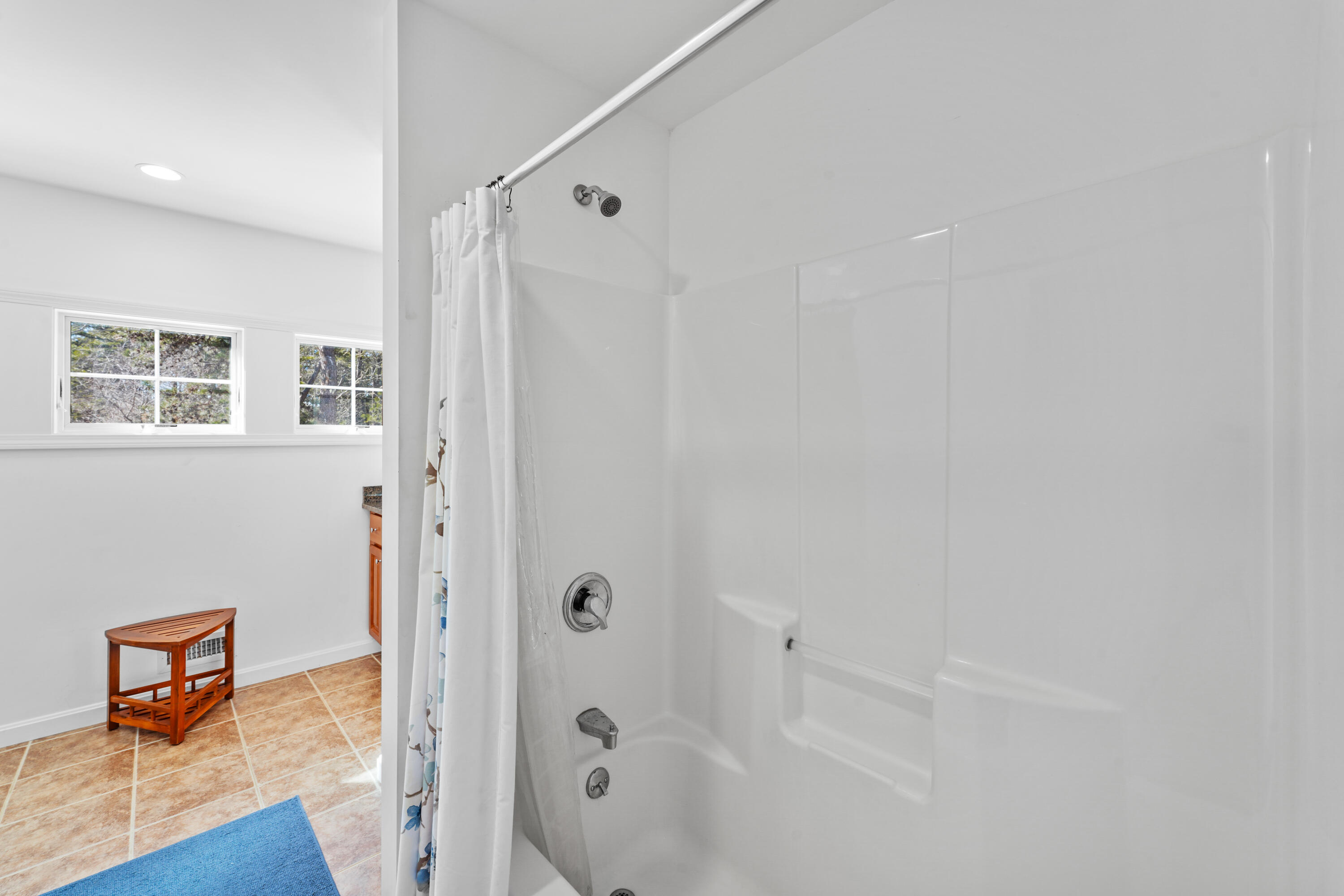 45 Perch Pond Way Wellfleet, MA 02667 - Photo 65 of 82 a bathroom with a tub and shower