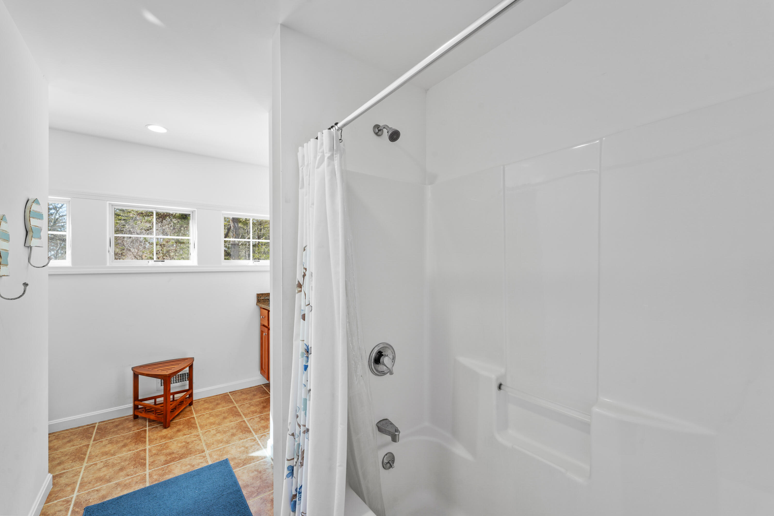 45 Perch Pond Way Wellfleet, MA 02667 - Photo 67 of 82 a bathroom with a tub and a shower