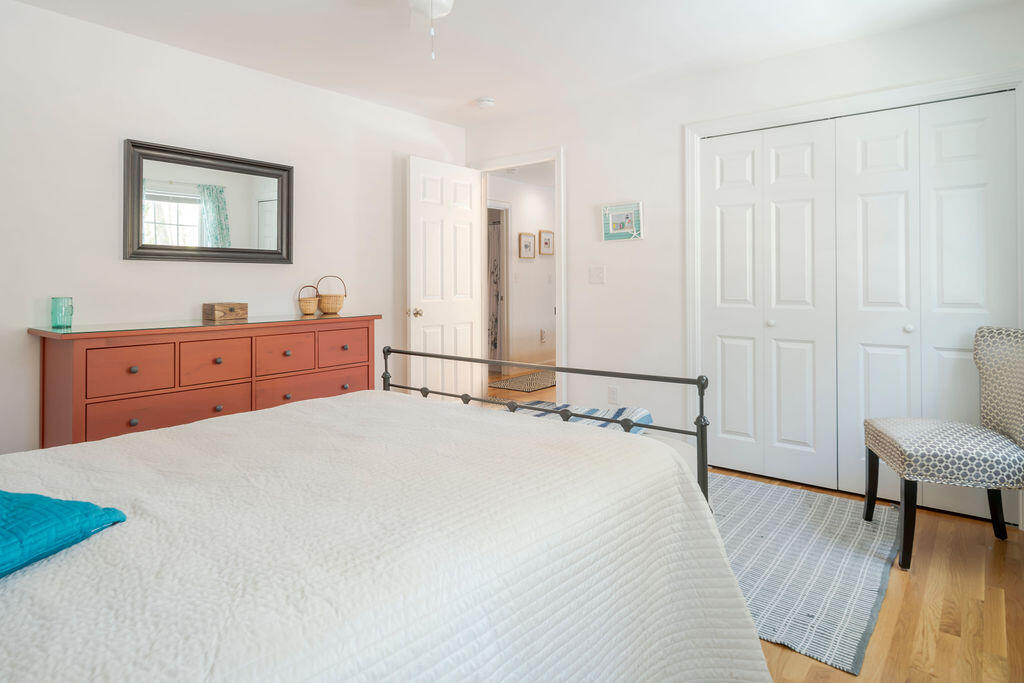 45 Perch Pond Way Wellfleet, MA 02667 - Photo 68 of 82 a bed room with a bed and a chair