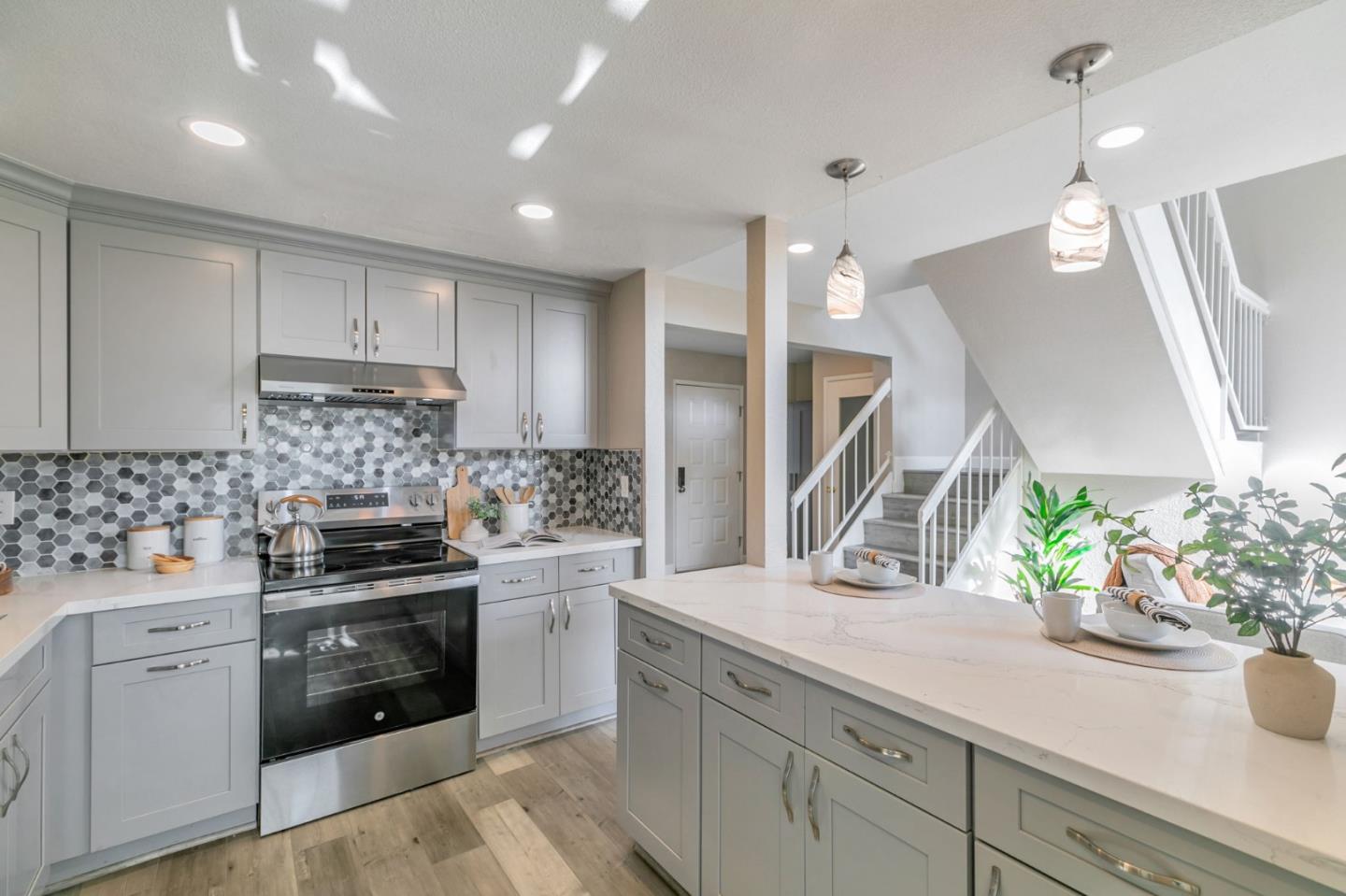 25 Terfidia Lane Milpitas, CA 95035 - Photo 1 of 1 a kitchen with a sink stove and cabinets