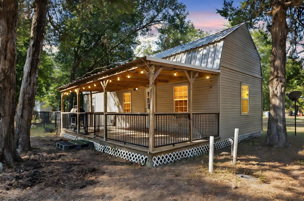 134 Maple Avenue Streetman, TX 75859 - Photo 2 of 19 View of front of house featuring a metal roof