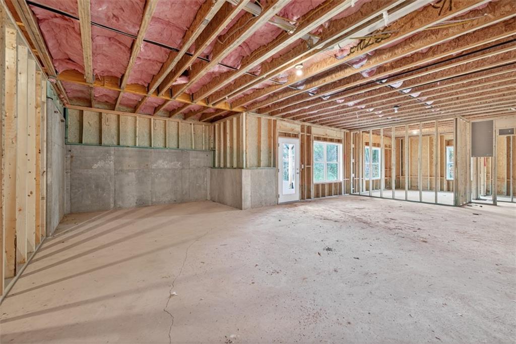 8845 Jot Em Down Road Gainesville, GA 30506 - Photo 60 of 87 a view of a room with wooden walls