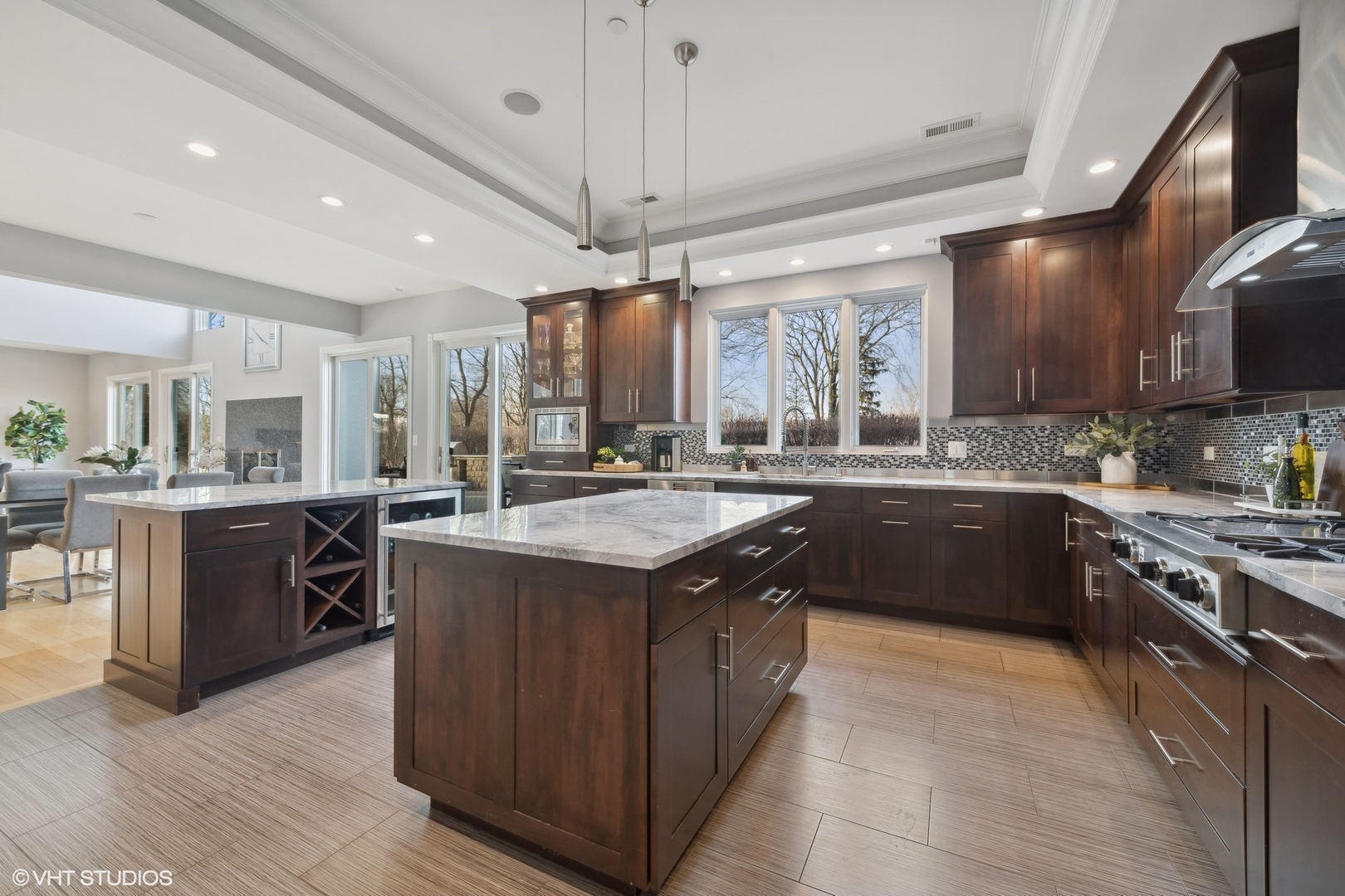 1853 Checker Road Long Grove, IL 60047 - Photo 20 of 63 a kitchen with stainless steel appliances granite countertop wooden cabinets a sink a stove a oven and a refrigerator
