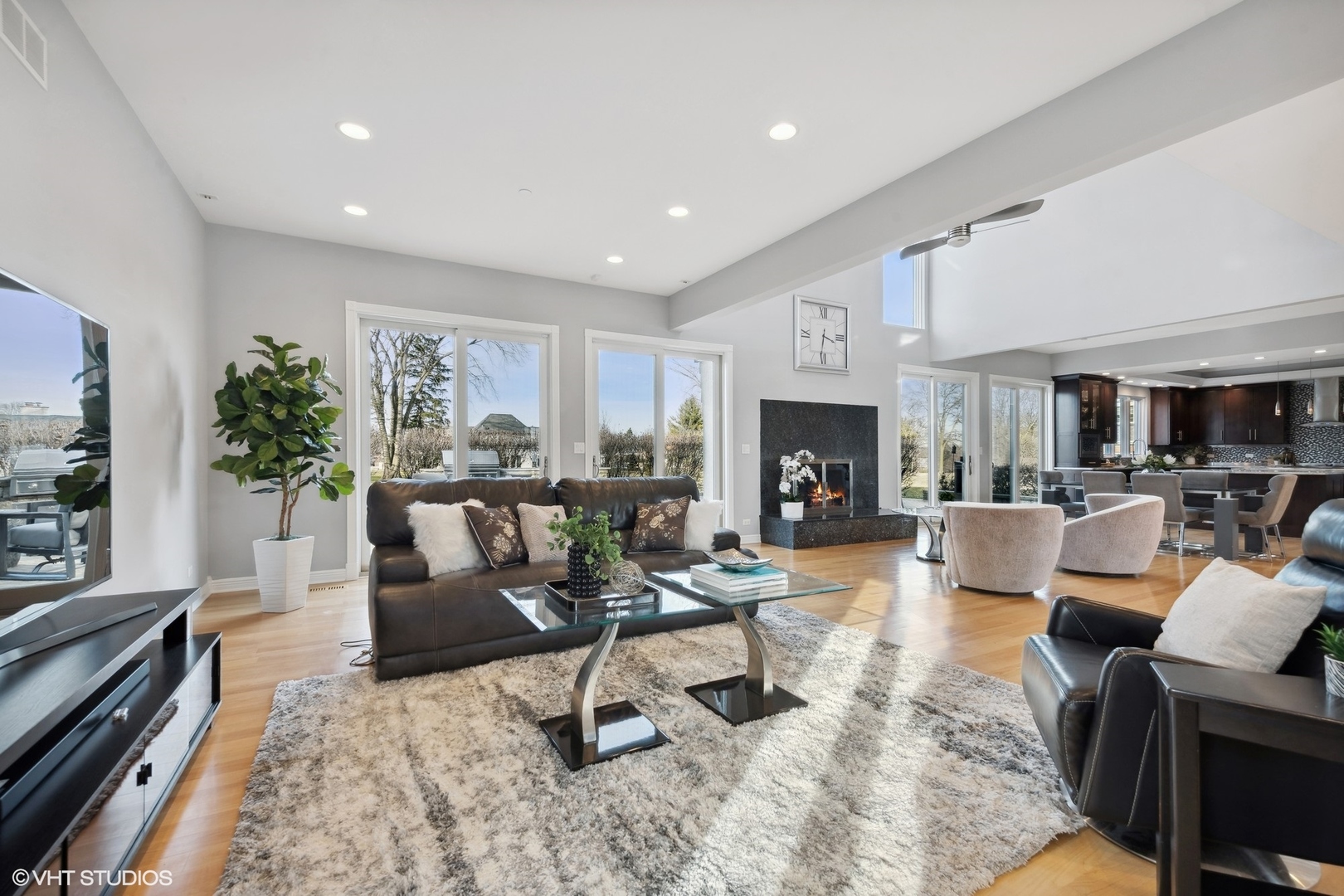 1853 Checker Road Long Grove, IL 60047 - Photo 28 of 63 a living room with furniture fireplace and window